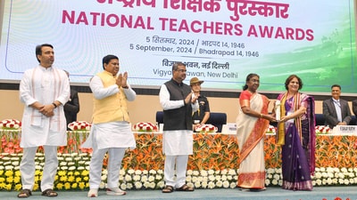 President Droupadi Murmu, Union Education Minister Dharmendra Pradhan, Union Ministers of State for Education Jayant Chaudhary and Sukanta Majumdar felicitate a teacher during the National Teachers Awards. (PTI Photo) (PTI) President Droupadi Murmu, Union Education Minister Dharmendra Pradhan, Union Ministers of State for Education Jayant Chaudhary and Sukanta Majumdar felicitate a teacher during the National Teachers Awards. (PTI Photo) (PTI)