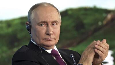 Russian President Vladimir Putin applauds during the plenary session of the Eastern Economic Forum in Vladivostok, Russia, on Thursday. (AP)