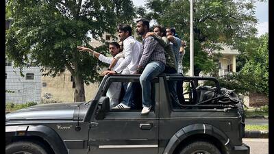 The convoy, spanning half a kilometer, began outside SD College and made its way towards Sector 49, blocking roads and causing inconvenience to commuters. (HT Photo) The convoy, spanning half a kilometer, began outside SD College and made its way towards Sector 49, blocking roads and causing inconvenience to commuters. (HT Photo)