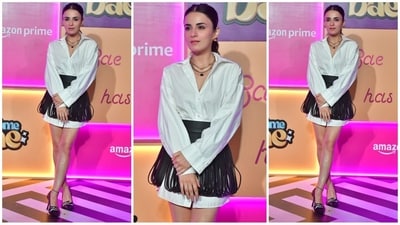Radhika Madan looked stunning in a white shirt dress paired with a black fringed mini skirt for a touch of flair. She completed her look with stacked necklaces, stud earrings, high heels, and her hair styled in a sleek ponytail. (HT Photo/VarinderChawla) Radhika Madan looked stunning in a white shirt dress paired with a black fringed mini skirt for a touch of flair. She completed her look with stacked necklaces, stud earrings, high heels, and her hair styled in a sleek ponytail. (HT Photo/VarinderChawla)