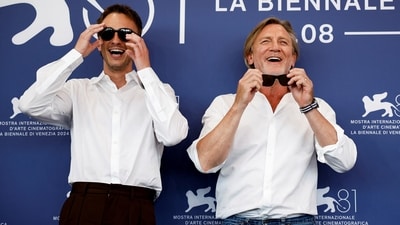 Cast members Drew Starkey and Daniel Craig pose during a photocall for the movie Queer, in competition, at the 81st Venice Film Festival. (REUTERS)