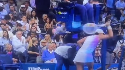 Iga Swiatek smashes her racket in anger. Iga Swiatek smashes her racket in anger.