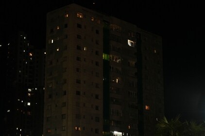 The lights of a residential building are seen turned off in protest against the alleged rape and murder of a trainee woman doctor at the RG Kar Medical College and Hospital, in Kolkata, on Wednesday, (PTI) The lights of a residential building are seen turned off in protest against the alleged rape and murder of a trainee woman doctor at the RG Kar Medical College and Hospital, in Kolkata, on Wednesday, (PTI)