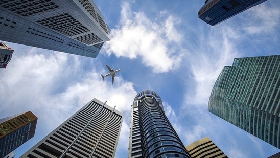 Singapore dollar reaches highest value since 2014, benefiting travelers and importers.