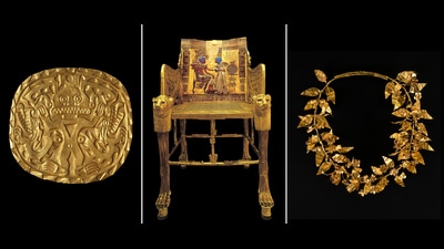 A warrior's plaque from 700 CE Panama; the ceremonial throne of the boy-king Tutankhamun, c. 1300 BCE; a wreath from Ancient Greece, c. 300 BE. A warrior's plaque from 700 CE Panama; the ceremonial throne of the boy-king Tutankhamun, c. 1300 BCE; a wreath from Ancient Greece, c. 300 BE.