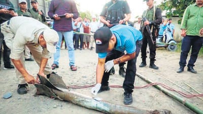 A team of Mobile Forensic Unit, DFS, Manipur collects evidence after what appeared to be a rocket attack, in the Moirang area of Bishnupur on Friday. (ANI) A team of Mobile Forensic Unit, DFS, Manipur collects evidence after what appeared to be a rocket attack, in the Moirang area of Bishnupur on Friday. (ANI)