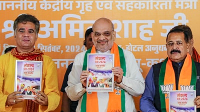 Home minister Amit Shah, MoS Jitendra Singh and Jammu and Kashmir BJP president Ravinder Raina during the release of BJP's election manifesto ahead of the state Assembly elections in Jammu on September 6. (PTI) Home minister Amit Shah, MoS Jitendra Singh and Jammu and Kashmir BJP president Ravinder Raina during the release of BJP's election manifesto ahead of the state Assembly elections in Jammu on September 6. (PTI)