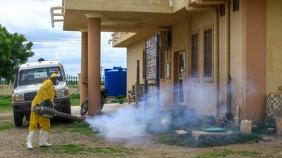 (FILES) A worker disinfects a rural isolation centre where patients are being treated for cholera in Wad Al-Hilu in Kassala state, eastern Sudan on August 17, 2024. The number of cholera cases and deaths rose sharply last year, the World Health Organization said on September 4, 2024, calling for more to be done to stem the preventable disease. (Photo by AFP) (AFP)