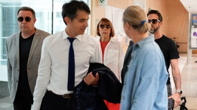 Gisele Pelicot, center, arrives in the Avignon court house, in France, on Thursday, Sept. 5, 2024. (AP Photo/Lewis Joly) Gisele Pelicot, center, arrives in the Avignon court house, in France, on Thursday, Sept. 5, 2024. (AP Photo/Lewis Joly)