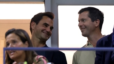 US Open 2024: Roger Federer talks with former ATP tennis player Tim Henman during the Men's Singles Quarterfinal match between Grigor Dimitrov of Bulgaria and Frances Tiafoe. (Getty Images via AFP) US Open 2024: Roger Federer talks with former ATP tennis player Tim Henman during the Men's Singles Quarterfinal match between Grigor Dimitrov of Bulgaria and Frances Tiafoe. (Getty Images via AFP)