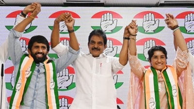 Olympian wrestlers Vinesh Phogat and Bajrang Punia with Congress leader KC Venugopal at the AICC headquarters in New Delhi on September 6. (HT photo/ Vipin Kumar) Olympian wrestlers Vinesh Phogat and Bajrang Punia with Congress leader KC Venugopal at the AICC headquarters in New Delhi on September 6. (HT photo/ Vipin Kumar)
