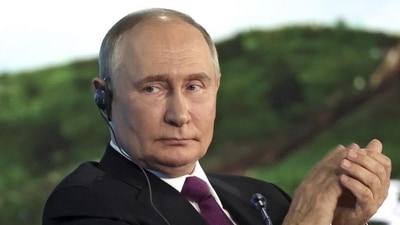 Russian President Vladimir Putin applauds during the plenary session of the Eastern Economic Forum in Vladivostok, Russia, on Thursday. (AP) Russian President Vladimir Putin applauds during the plenary session of the Eastern Economic Forum in Vladivostok, Russia, on Thursday. (AP)
