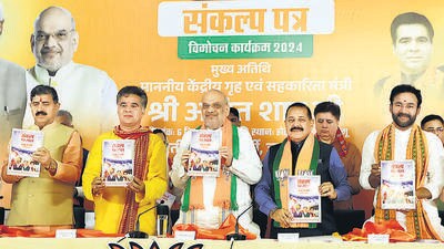 Union home minister Amit Shah releases the BJP manifesto for the J&K elections in Jammu on Friday. (ANI) Union home minister Amit Shah releases the BJP manifesto for the J&K elections in Jammu on Friday. (ANI)