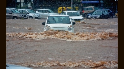 Vehicles stranded on a waterlogged road amid heavy rain in Panchkula on Friday. (Sant Arora/HT) Vehicles stranded on a waterlogged road amid heavy rain in Panchkula on Friday. (Sant Arora/HT)