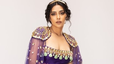 And in this purple and gold lehenga with dramatic cape, she looks like a warrior princess with loose curls and soft makeup completing the look. And in this purple and gold lehenga with dramatic cape, she looks like a warrior princess with loose curls and soft makeup completing the look.