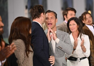 English actors Tom Hiddleston and Jude Law chat during the Ralph Lauren Spring/Summer 2025 collection runway show in Bridgehampton, New York. (AFP) English actors Tom Hiddleston and Jude Law chat during the Ralph Lauren Spring/Summer 2025 collection runway show in Bridgehampton, New York. (AFP)