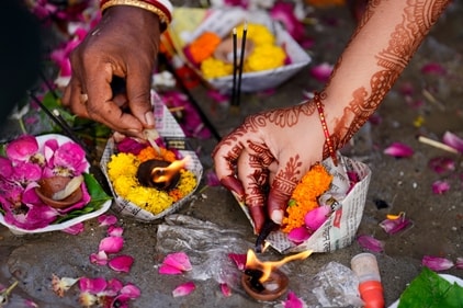 A Hindu woman offers prayers on the occasion of Hartalika Teej festival. (AP) A Hindu woman offers prayers on the occasion of Hartalika Teej festival. (AP)