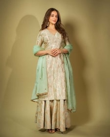 Choose a light green and golden Banarasi sharara set like actor Rakul Preet Singh for the visarjan day (Photo: Instagram) Choose a light green and golden Banarasi sharara set like actor Rakul Preet Singh for the visarjan day (Photo: Instagram)
