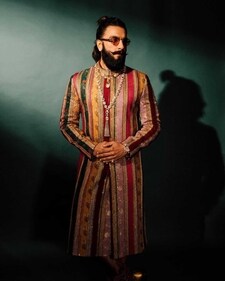 Wear a multi-coloured striped kurta set like Ranveer Singh as you pandal hop (Photo: Instagram) Wear a multi-coloured striped kurta set like Ranveer Singh as you pandal hop (Photo: Instagram)