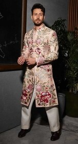 Like actor Tiger Shroff and slip into a floral sherwani kurta with straight-leg pants (Photo: Instagram) Like actor Tiger Shroff and slip into a floral sherwani kurta with straight-leg pants (Photo: Instagram)