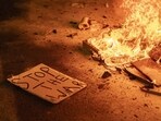 A placard next to a fire during a demonstration urging the government into securing the release of Gaza hostages in Tel Aviv, Israel, on Wednesday, Sept. 4, 2024. Photographer: David Lombeida/Bloomberg A placard next to a fire during a demonstration urging the government into securing the release of Gaza hostages in Tel Aviv, Israel, on Wednesday, Sept. 4, 2024. Photographer: David Lombeida/Bloomberg