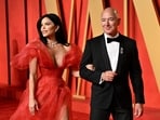 Lauren Sanchez, left, and Jeff Bezos arrive at the Vanity Fair Oscar Party. Lauren Sanchez, left, and Jeff Bezos arrive at the Vanity Fair Oscar Party.