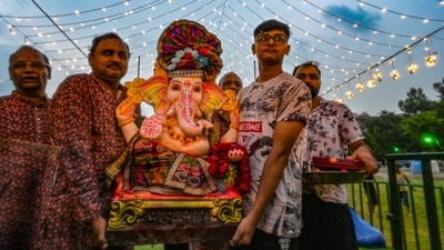Ganesh Chaturthi 2024: Devotees carry an idol of Lord Ganesha in Laxmi Nagar area of New Delhion September 7, 2024. (Raj K Raj/HT photo) Ganesh Chaturthi 2024: Devotees carry an idol of Lord Ganesha in Laxmi Nagar area of New Delhion September 7, 2024. (Raj K Raj/HT photo)