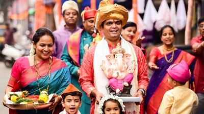 A family in Pune carried a Lord Ganesha idol on the eve of Ganesh Chaturthi. President Droupadi Murmu extended her warm greetings to Indians both domestically and abroad for the festival. (PTI) A family in Pune carried a Lord Ganesha idol on the eve of Ganesh Chaturthi. President Droupadi Murmu extended her warm greetings to Indians both domestically and abroad for the festival. (PTI)
