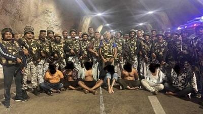 The suspects, who were travelling in a Toyota Innova (MH26AC5599) were intercepted at 5.45am in the Samruddhi highway tunnel by personnel of the Chhatrapati Sambhaji Nagar Police. (HT Photo) The suspects, who were travelling in a Toyota Innova (MH26AC5599) were intercepted at 5.45am in the Samruddhi highway tunnel by personnel of the Chhatrapati Sambhaji Nagar Police. (HT Photo)