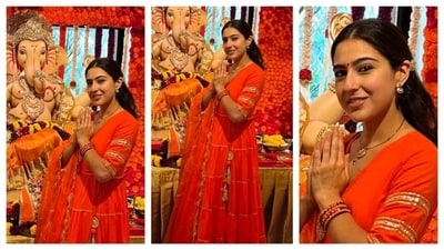 Sara Ali Khan wore a red anarkali set and it has a subtle golden embroidery work on the sleeves and in the skirt and dupatta. Opting for a golden droplet earring, pendant, and simple bangles, she kept her glam minimalistic. (Instagram/saraalikhan95) Sara Ali Khan wore a red anarkali set and it has a subtle golden embroidery work on the sleeves and in the skirt and dupatta. Opting for a golden droplet earring, pendant, and simple bangles, she kept her glam minimalistic. (Instagram/saraalikhan95)