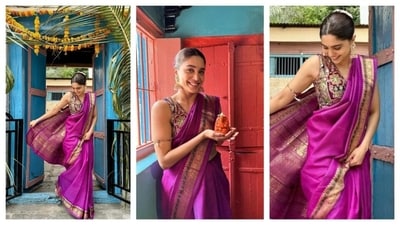 Sharvari Wagh wore a saree in a rich purple shade. With golden work at the borders, the gold accents in both her saree and sleeveless blouse complemented the primary purple colour of her saree well. Her blouse had an artsy design. Styling her hair in a neat bun, she adorned it with a white garland. To seal the glam festive look, she finished the look with a pair of golden jhumkas and bindi. (Instagram/@sharvari) Sharvari Wagh wore a saree in a rich purple shade. With golden work at the borders, the gold accents in both her saree and sleeveless blouse complemented the primary purple colour of her saree well. Her blouse had an artsy design. Styling her hair in a neat bun, she adorned it with a white garland. To seal the glam festive look, she finished the look with a pair of golden jhumkas and bindi. (Instagram/@sharvari)