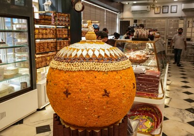 A worker prepares a big size 'Laddu', weighed 500kg, fpr sale during the Ganesh Chaturthi festival, in Kolkata, Saturday, Sept. 7, 2024. (PTI) A worker prepares a big size 'Laddu', weighed 500kg, fpr sale during the Ganesh Chaturthi festival, in Kolkata, Saturday, Sept. 7, 2024. (PTI)