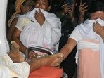 Family members of a person who was killed when a missile struck mourn at Moirang in Manipur on September 6, 2024.