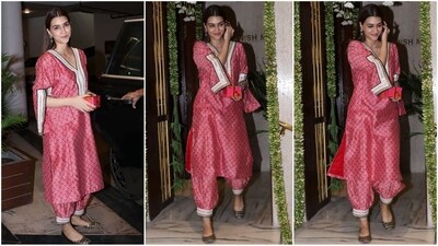 Kriti Sanon embraced minimalism in a red printed silk suit with a V-neckline and matching salwar pants. With minimal makeup, she looked effortlessly stylish and elegant. (Instagram) Kriti Sanon embraced minimalism in a red printed silk suit with a V-neckline and matching salwar pants. With minimal makeup, she looked effortlessly stylish and elegant. (Instagram)