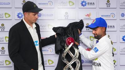 Afghanistan skipper Hashmatullah Shahidi and his New Zealand counterpart Tim Southee unveil the trophy. (PTI) Afghanistan skipper Hashmatullah Shahidi and his New Zealand counterpart Tim Southee unveil the trophy. (PTI)
