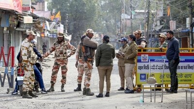 ITBP and Uttarakhand Police personnel stand guard on a road on February 12, 2024, during a curfew in Haldwani’s Banbhoolpura area following incidents of violence. (Representative Image/PTI File Photo) (HT_PRINT) ITBP and Uttarakhand Police personnel stand guard on a road on February 12, 2024, during a curfew in Haldwani’s Banbhoolpura area following incidents of violence. (Representative Image/PTI File Photo) (HT_PRINT)