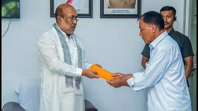Manipur chief minister N Biren Singh hands over ex-gratia to the family members of the victims of Kuki militants attack at Koutruk, in Imphal, on Sunday. (PTI) Manipur chief minister N Biren Singh hands over ex-gratia to the family members of the victims of Kuki militants attack at Koutruk, in Imphal, on Sunday. (PTI)