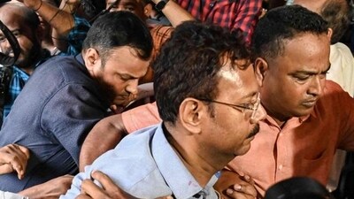 Sandip Ghosh being taken to Alipore judges district and session court in in Kolkata on Tuesday. (ANI) Sandip Ghosh being taken to Alipore judges district and session court in in Kolkata on Tuesday. (ANI)