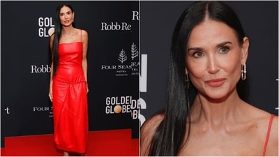 Demi Moore turned heads at the Golden Globes Party in a stunning red dress. Featuring spaghetti straps, a shiny fabric, a flared bottom, and a straight neckline, she owned the red carpet with effortless diva flair. (Instagram) Demi Moore turned heads at the Golden Globes Party in a stunning red dress. Featuring spaghetti straps, a shiny fabric, a flared bottom, and a straight neckline, she owned the red carpet with effortless diva flair. (Instagram)