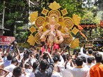 Surat: Devotees carrying an idol of Lord Ganesh to the pandal during Ganesh Chaturthi festival celebrations, in Surat, Saturday, Sept. 7, 2024. (PTI Photo)