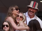 Tennis - U.S. Open - Flushing Meadows, New York, United States - September 8, 2024 Singer Taylor Swift embraces Brittany Mahomes, next to Kansas City Chiefs' Travis Kelce during the final match between Italy's Jannik Sinner and Taylor Fritz of the U.S. REUTERS/Mike Segar