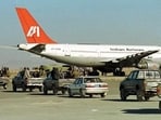 A file photo of Indian Airlines IC-814 passenger aircraft at Kandahar with armed Taliban surrounding the plane A file photo of Indian Airlines IC-814 passenger aircraft at Kandahar with armed Taliban surrounding the plane