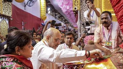 **EDS: IMAGE VIA @AmitShah ON SEPT. 9, 2024** Mumbai: Union Home Minister Amit Shah offers prayers at 'Lalbaug Ka Raja' during Ganesh Chaturthi festival, in Mumbai. (PTI Photo) (PTI09_09_2024_000230B) (PTI) **EDS: IMAGE VIA @AmitShah ON SEPT. 9, 2024** Mumbai: Union Home Minister Amit Shah offers prayers at 'Lalbaug Ka Raja' during Ganesh Chaturthi festival, in Mumbai. (PTI Photo) (PTI09_09_2024_000230B) (PTI)