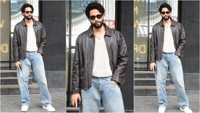 Siddhant Chaturvedi looks dapper in his latest outfit, rocking a basic white V-neck T-shirt paired with light blue baggy jeans and a brown biker jacket. Styled with white sneakers and black sunglasses, he nails the effortlessly stylish vibe. (HT photo/VarinderChawla)