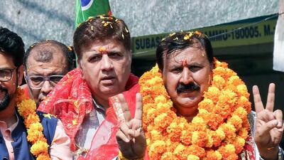 BJP’s Jammu West Assembly seat Arvind Gupta show victory signs before filing his nomination papers. (ANI) BJP’s Jammu West Assembly seat Arvind Gupta show victory signs before filing his nomination papers. (ANI)