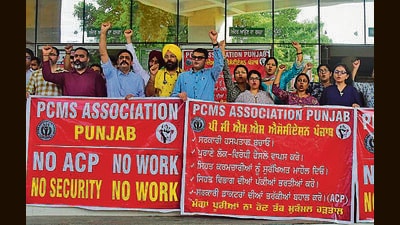 Doctors staging a protest against the state government regarding their demands at the Civil Hospital in Ludhiana on Monday. (HT Photo) Doctors staging a protest against the state government regarding their demands at the Civil Hospital in Ludhiana on Monday. (HT Photo)