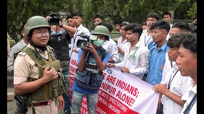 Imphal [Manipur] Sept 09 (ANI): Police personnel appeal to stop student protesters during their march to Raj Bhavan demanding the removal of DGP and Security Advisor over the situation in the state, in Imphal on Monday. (ANI Photo) (ANI)