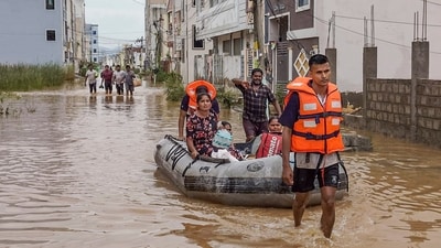 Indian Navy personnel conduct rescue and relief operation in flood affected areas of Vijayawada, Andhra Pradesh. (PTI Photo) (PTI) Indian Navy personnel conduct rescue and relief operation in flood affected areas of Vijayawada, Andhra Pradesh. (PTI Photo) (PTI)