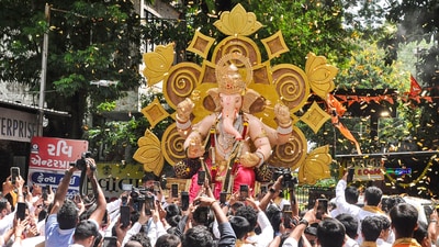 Surat: Devotees carrying an idol of Lord Ganesh to the pandal during Ganesh Chaturthi festival celebrations, in Surat, Saturday, Sept. 7, 2024. (PTI Photo) (PTI) Surat: Devotees carrying an idol of Lord Ganesh to the pandal during Ganesh Chaturthi festival celebrations, in Surat, Saturday, Sept. 7, 2024. (PTI Photo) (PTI)
