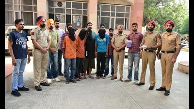 The four associates of Canada-based gangster Gopi Lahoria after their arrest at Bathinda in Punjab on Monday. (HT Photo) The four associates of Canada-based gangster Gopi Lahoria after their arrest at Bathinda in Punjab on Monday. (HT Photo)
